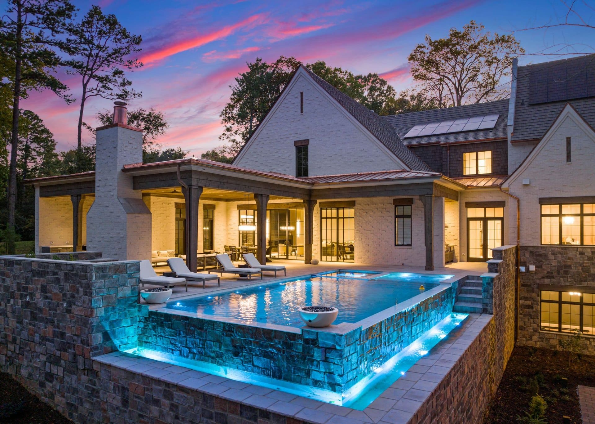 Luxury indoor pool and rear estate view at The Charlotte Masterpiece